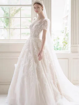 Элегантное свадебное платье трапециевидной формы с пышным вырезом и блестящей кружевной аппликацией из тюля, роскошное платье принцессы-феи с белым цветком для невесты